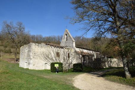 A semi-ruined church in a field