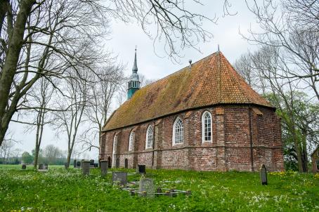 Simple brick church and graveyard 