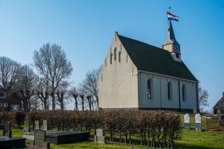 Grey church and graveyard