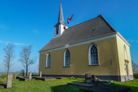 Simple white church and cementery