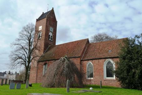 Brick church in a field