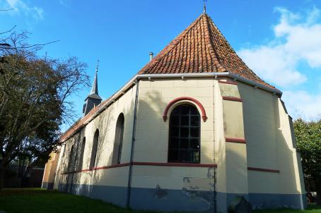 white church with red plaster details