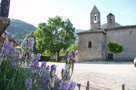 A church with a tower next to a square