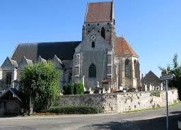 Lateral facade of a church and side view of the choir