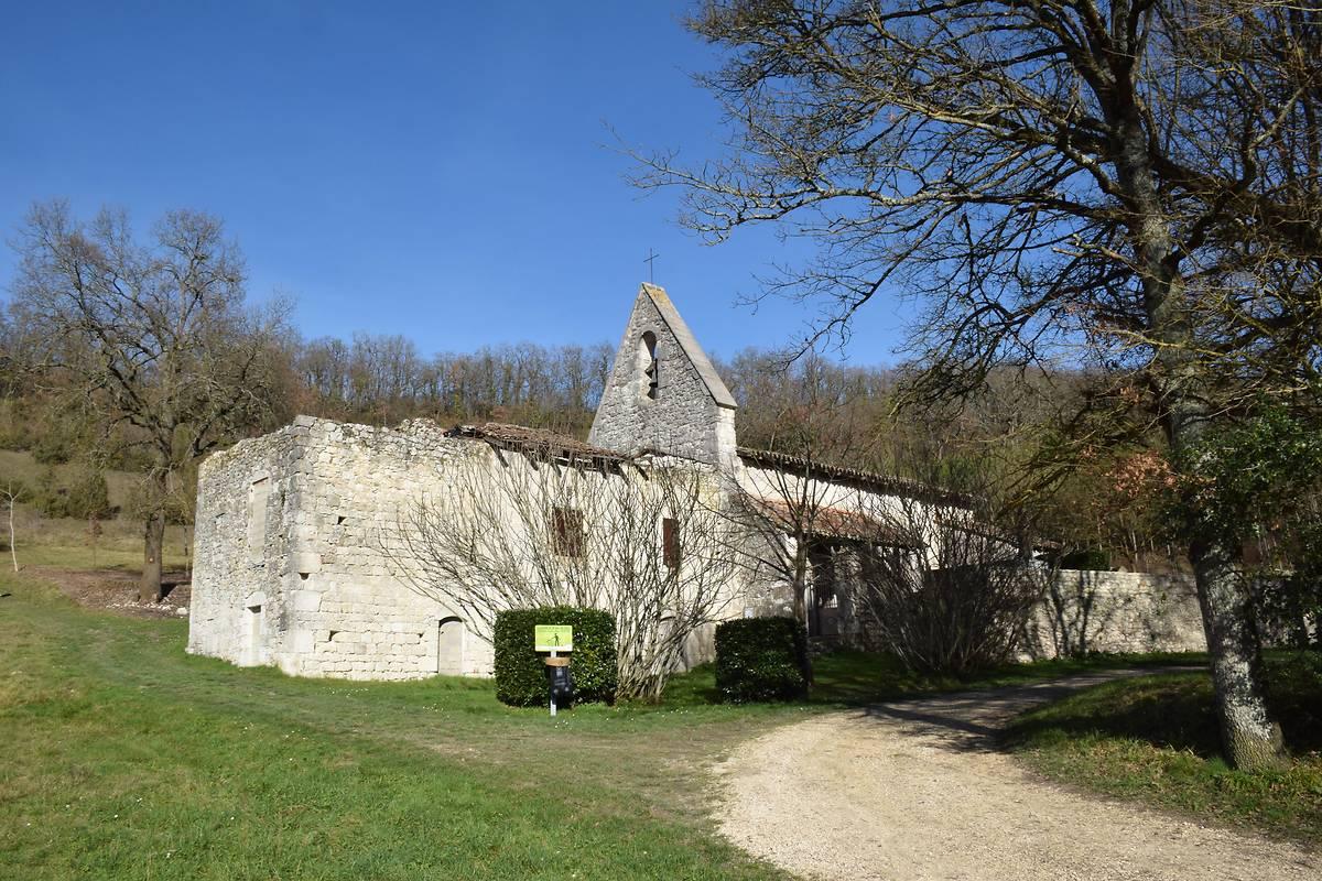 A semi-ruined church in a field