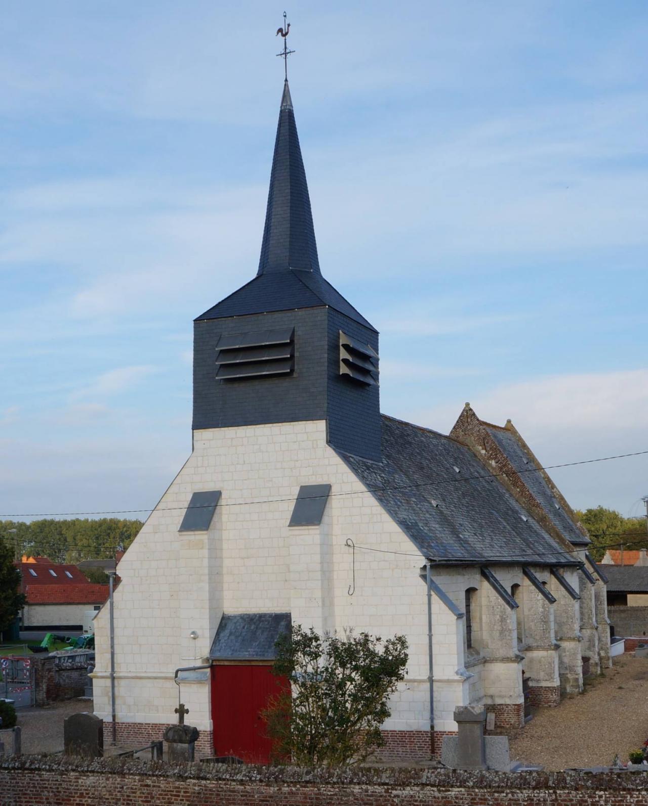 White church with slate pinnacle and roof