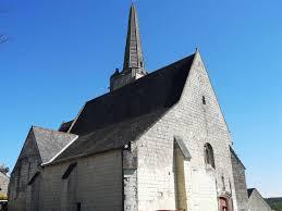 Church with a long pinnacle on a sunny day