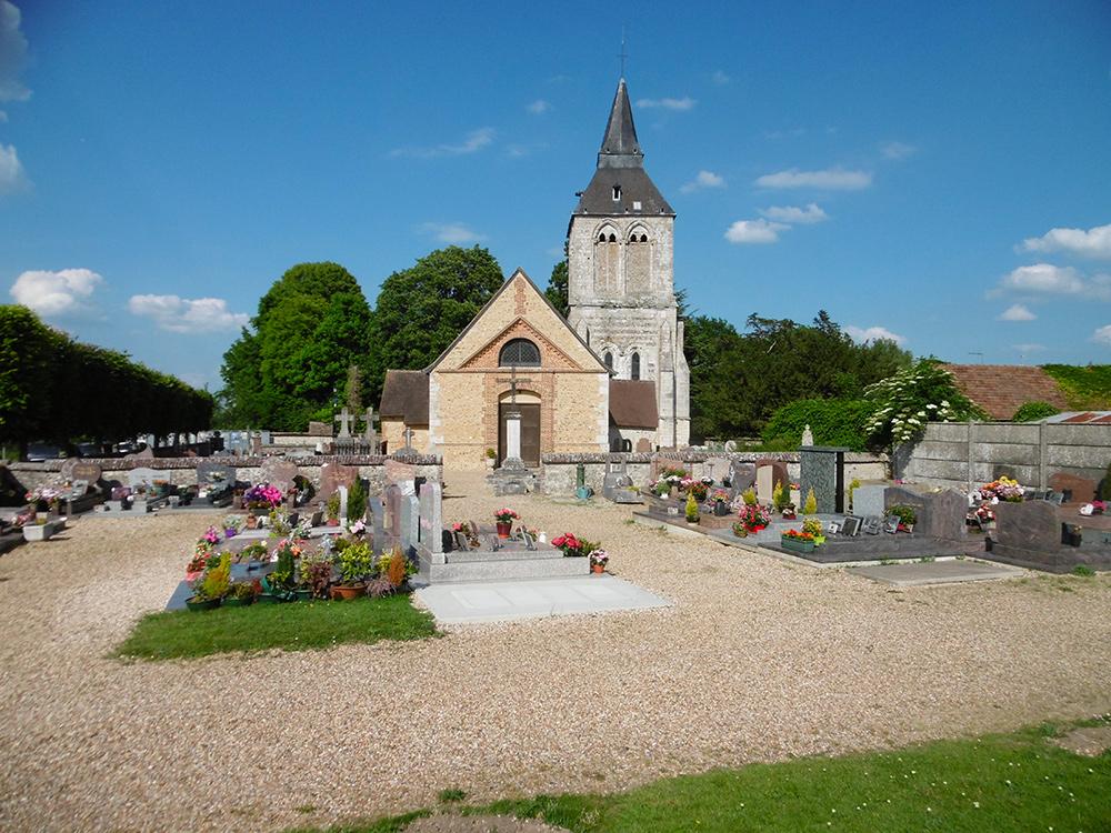 Church and bell tower surraunded by a graveyard