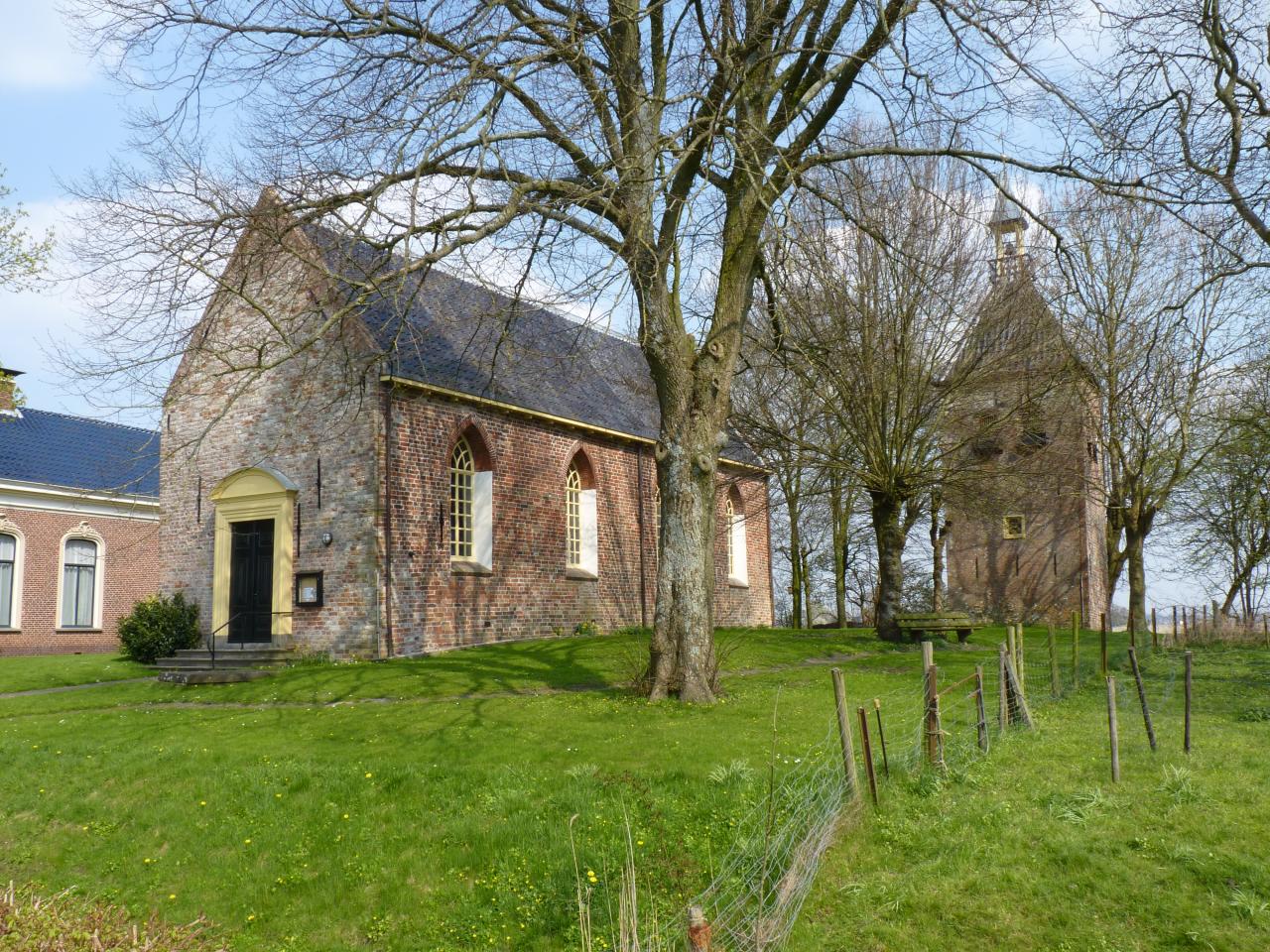 13th century church and annected bell tower in the countryside