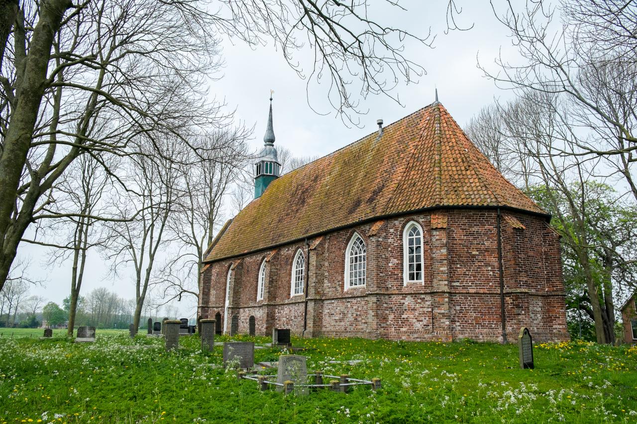 Simple brick church and graveyard 