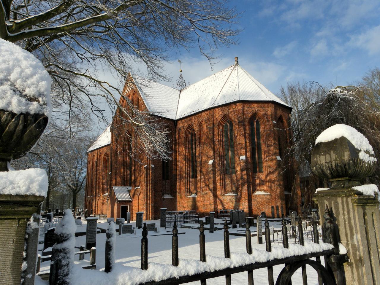 Late Roman church and cementery covered in snow