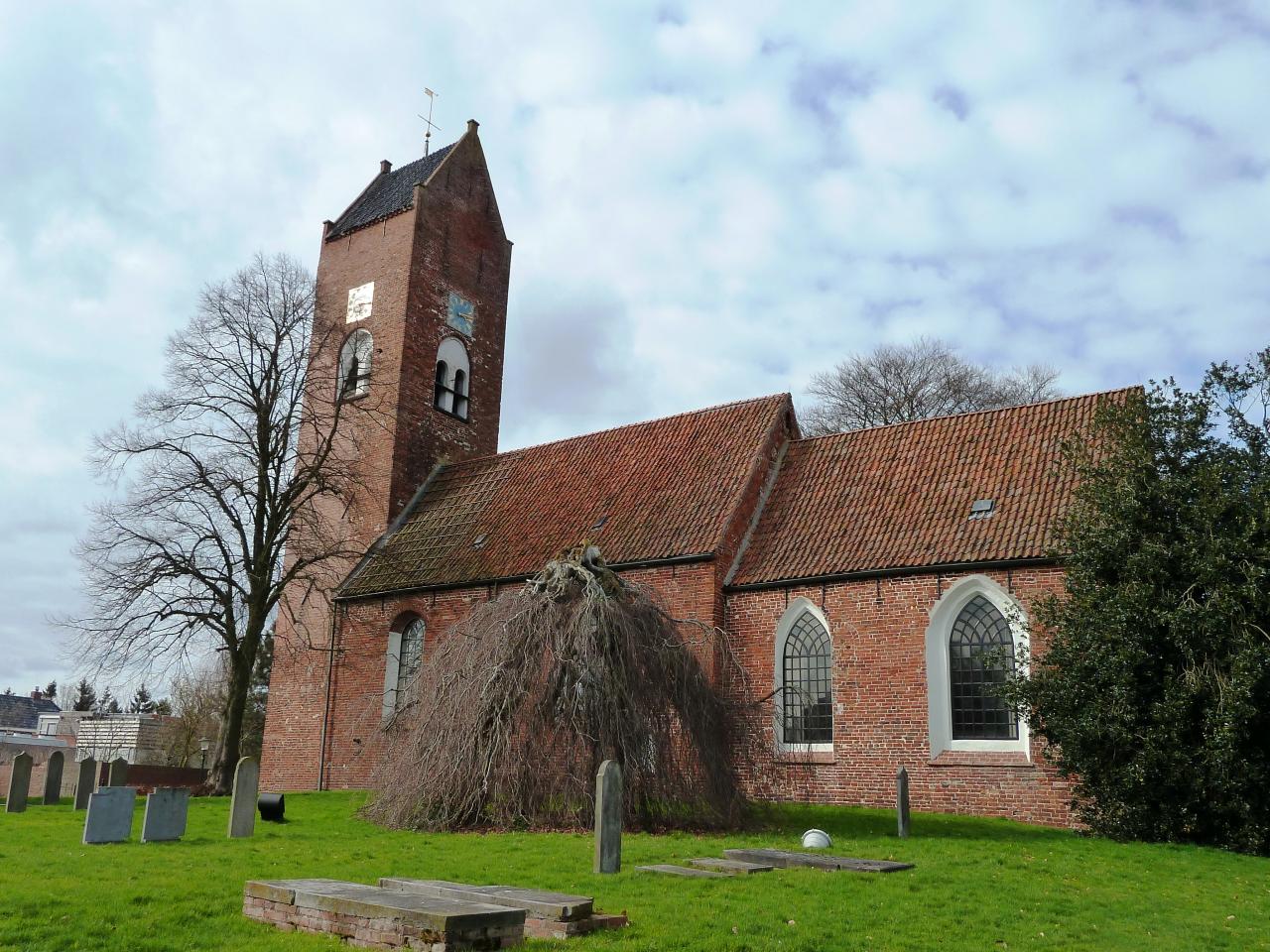 Brick church in a field