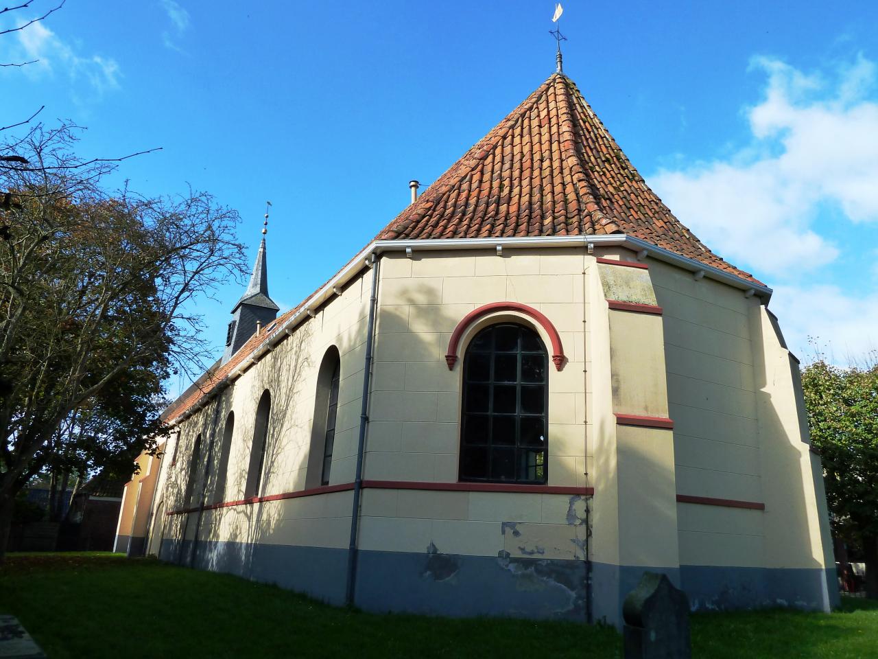 white church with red plaster details