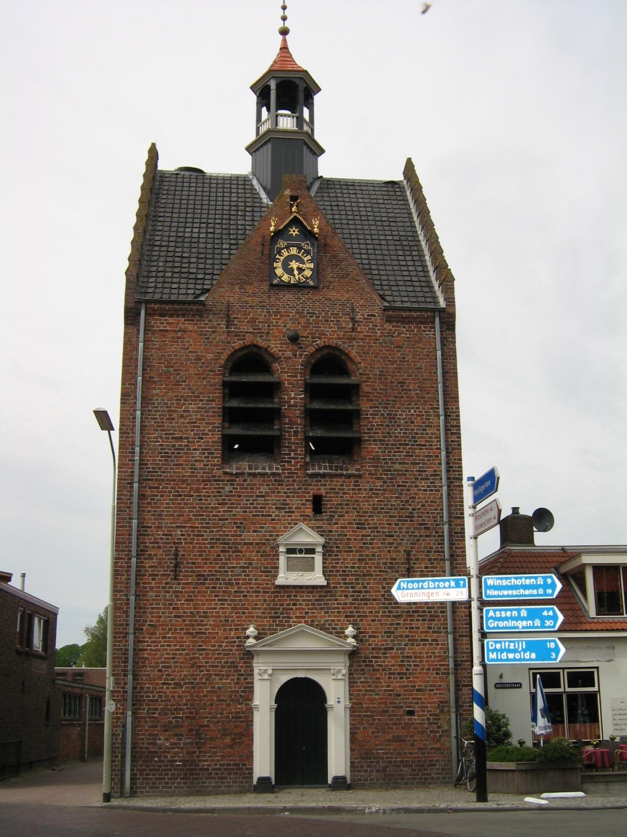 Tower with clock and small turret