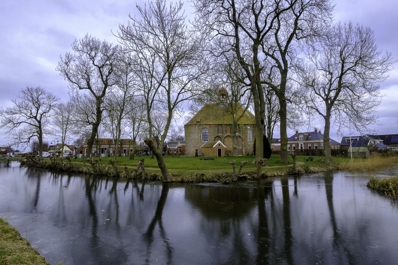 Landscape of a church near a river