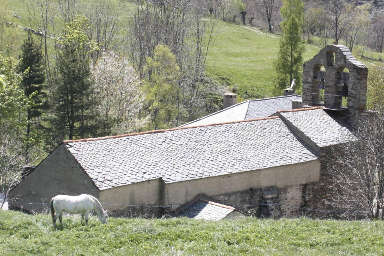 A church surrounded by hills 