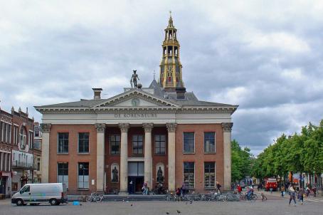 Red building with a colonnade