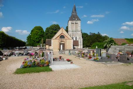 Church and bell tower surraunded by a graveyard