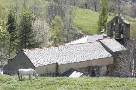 A church surrounded by hills 