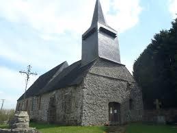 Small church in a park and crucifix