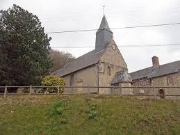 Small church surrounded by field