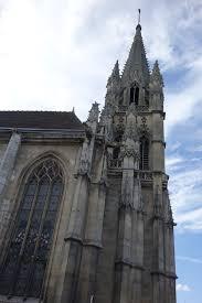 Bell tower of a church decorated with spires and pinnacles