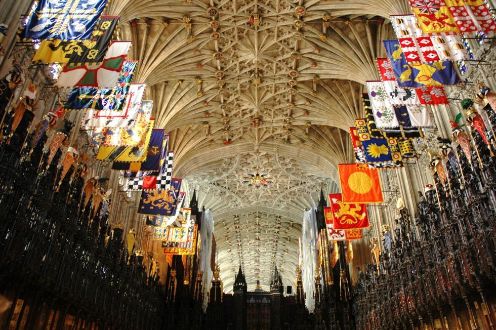 Interior and elaborate ceiling of a church choir with draps and decorations