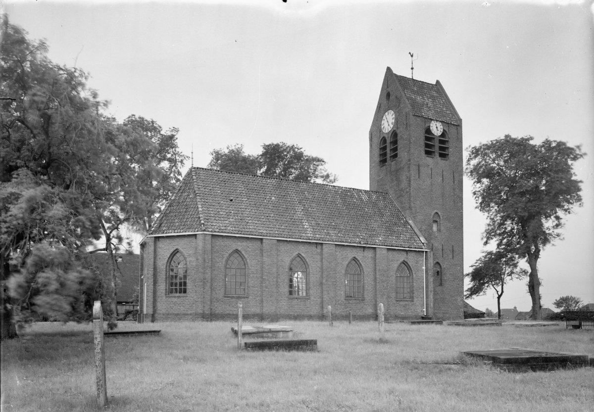 Black and white pcture of a church in a park